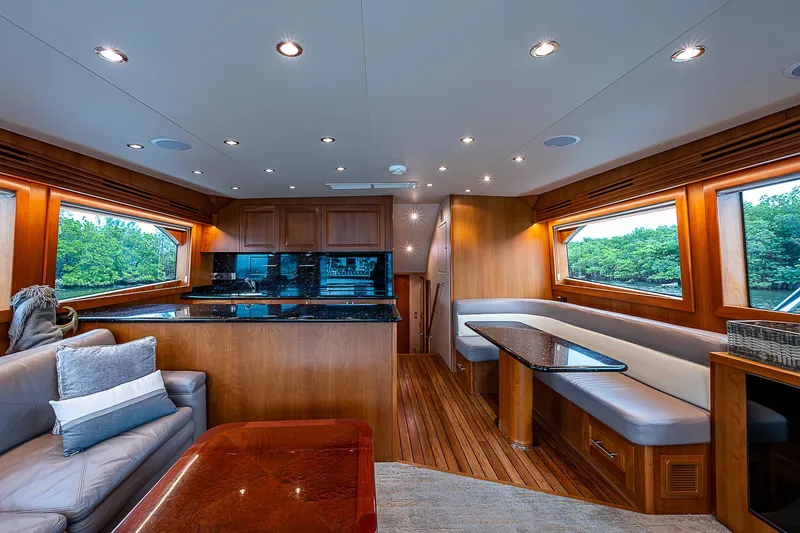 Slide: The Image of Luxurious interior of 2008 Hatteras 60 GT yacht with wood finishes and modern amenities. - 18
