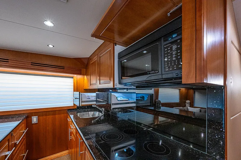 Slide: The Image of Luxurious kitchen interior of 2008 Hatteras 60 GT yacht with modern appliances. - 20