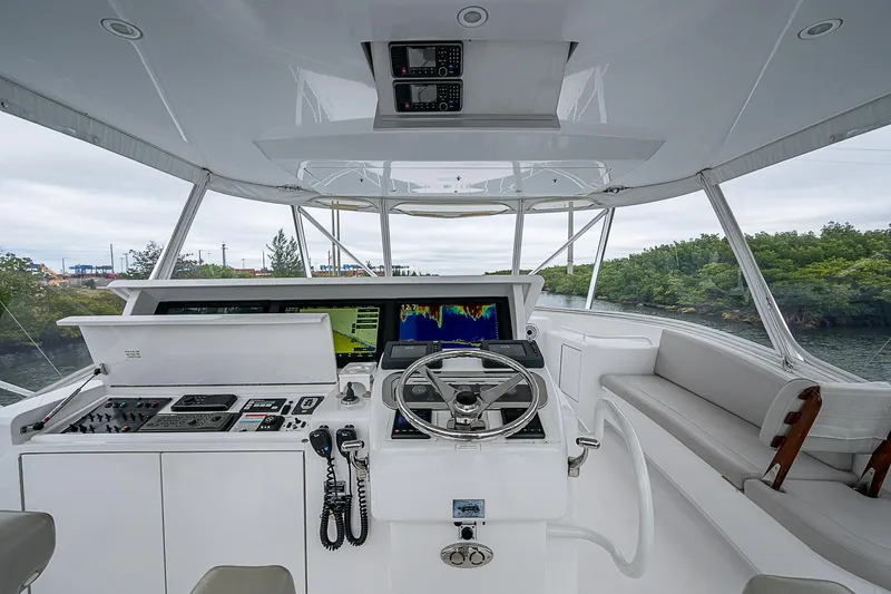 Slide: The Image of Helm of 2008 Hatteras 60 GT yacht with modern navigation equipment. - 38