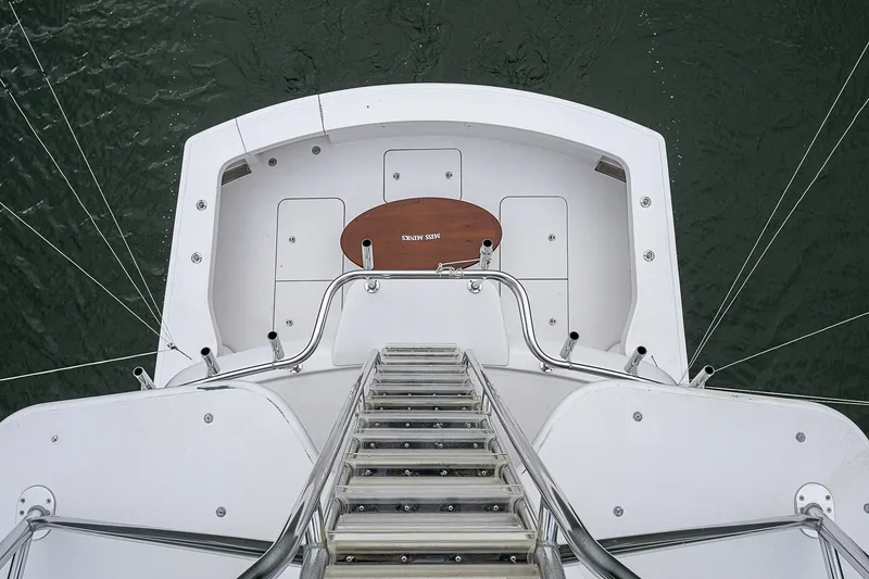 Slide: The Image of Overhead view of 2008 Hatteras 60 GT yacht deck with ladder and seating area. - 46