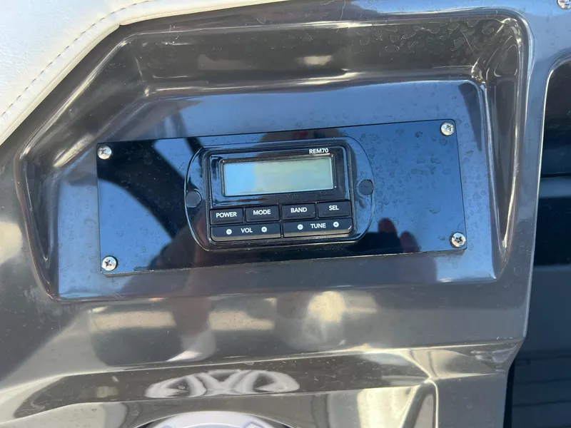 Slide: The Image of Control panel of a 2021 Monterey 275 Super Sport boat with digital display. - 24