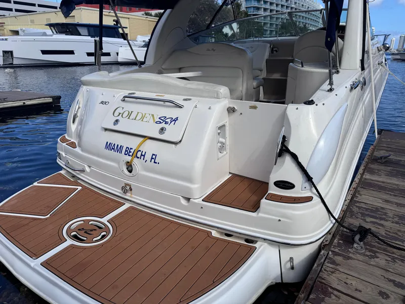 Slide: The Image of 2005 Sea Ray 280 Sundancer docked in Miami Beach, FL, with teak deck. - 14