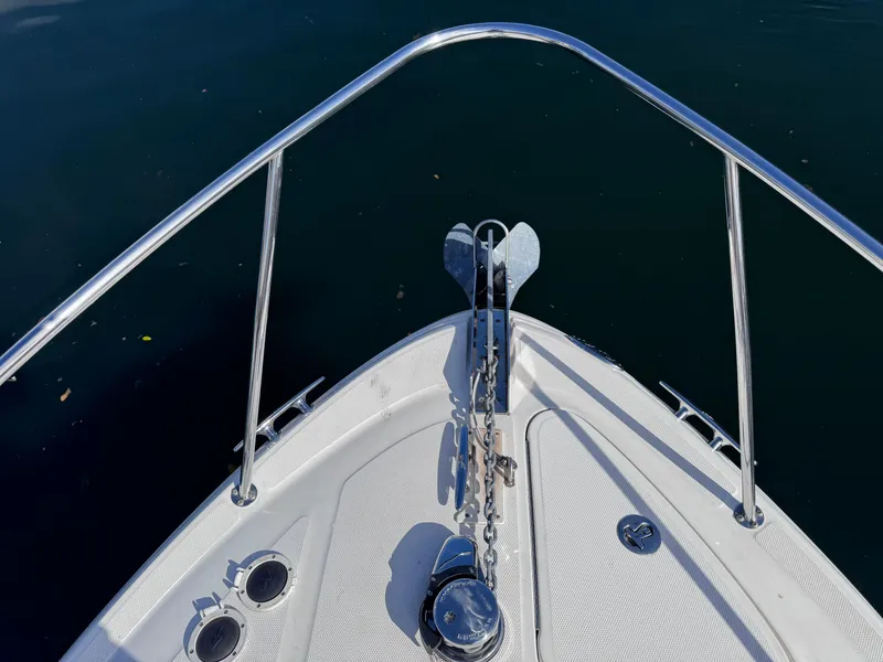 Slide: The Image of Bow of 2005 Sea Ray 280 Sundancer with anchor and railing. - 43