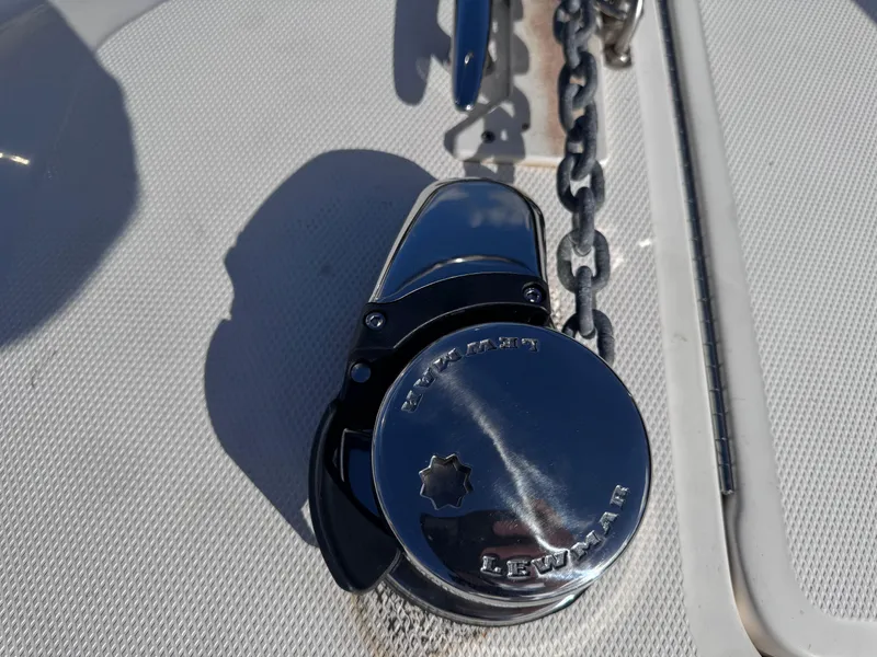 Slide: The Image of Chrome anchor windlass on 2005 Sea Ray 280 Sundancer boat deck. - 44