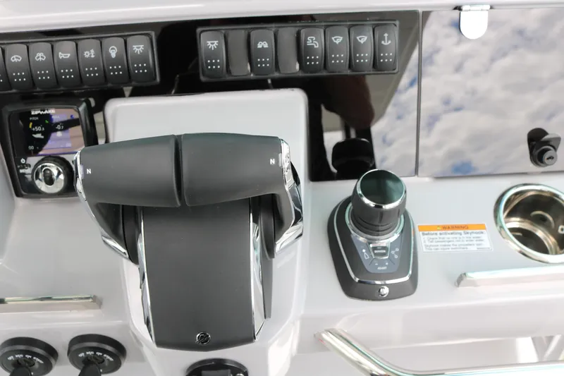 Slide: The Image of Control panel of 2026 Jeanneau Leader 10.5 WA Series 2 boat, featuring advanced navigation controls. - 16