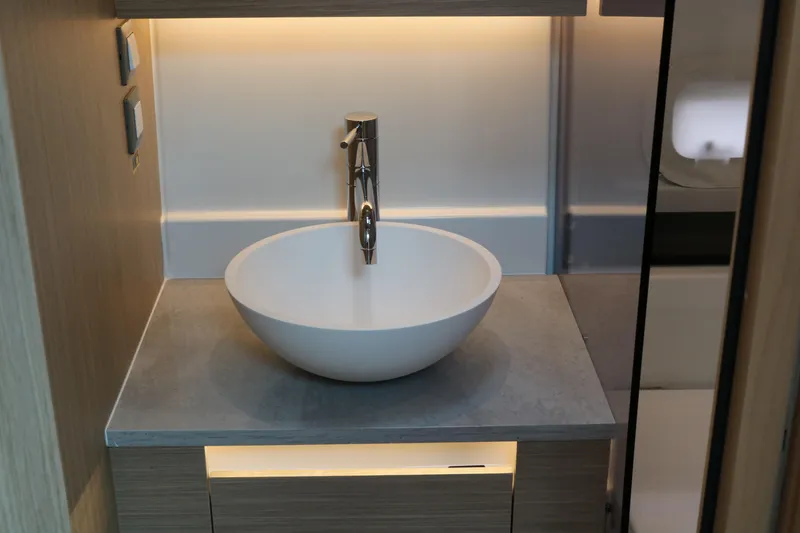 Slide: The Image of Modern bathroom sink in 2026 Jeanneau Leader 10.5 WA Series 2 yacht. - 28