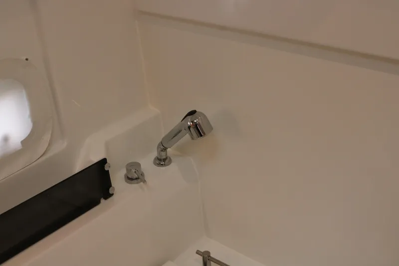 Slide: The Image of Interior detail of 2026 Jeanneau Leader 10.5 WA Series 2 boat, featuring a sleek chrome faucet. - 30