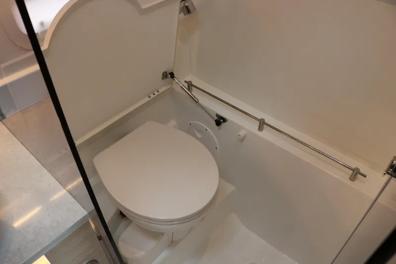 Slide: The Image of Compact bathroom in 2026 Jeanneau Leader 10.5 WA Series 2 boat. - 31