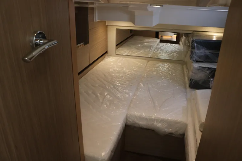 Slide: The Image of Interior cabin of 2026 Jeanneau Leader 10.5 WA Series 2 with twin beds. - 33