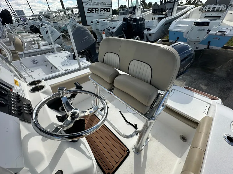 Slide: The Image of 2018 Sea Fox 186 Commander boat interior with steering wheel and seating. - 10