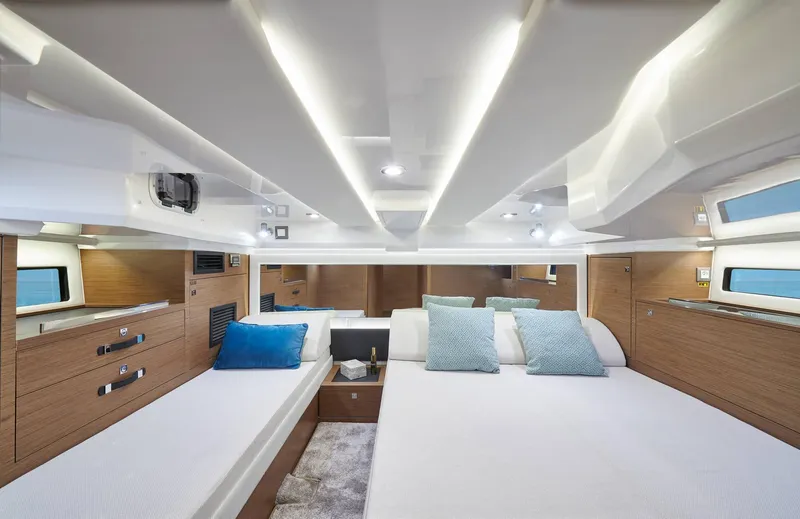 Slide: The Image of Luxurious cabin interior of 2025 Jeanneau Leader 12.5 WA with modern design and cozy bedding. - 18