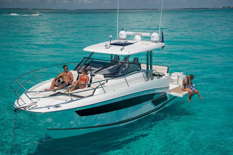 Slide: The Image of 2025 Jeanneau Leader 12.5 WA cruising in clear turquoise waters. - 3