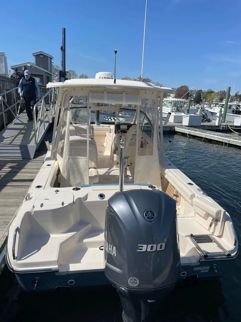 Slide: The Image of 2018 Grady-White Freedom 255 boat docked with Yamaha 300 engine. - 34