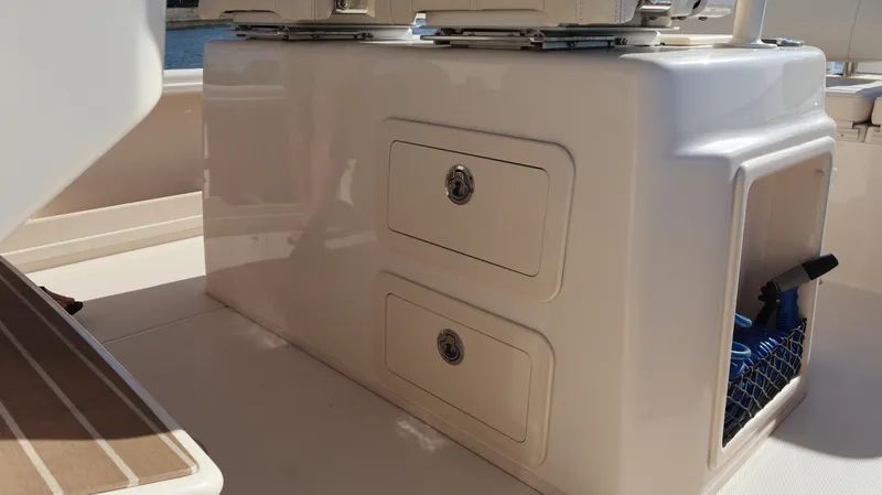 Slide: The Image of 2023 Grady-White 281 Coastal Explorer boat storage compartments. - 16