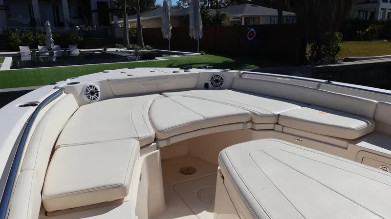 Slide: The Image of 2023 Grady-White 281 Coastal Explorer boat with spacious seating area and modern design. - 38