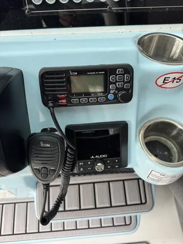 Slide: The Image of 2024 Tidewater 2300 Carolina Bay boat console with Icom radio and JL Audio system. - 10