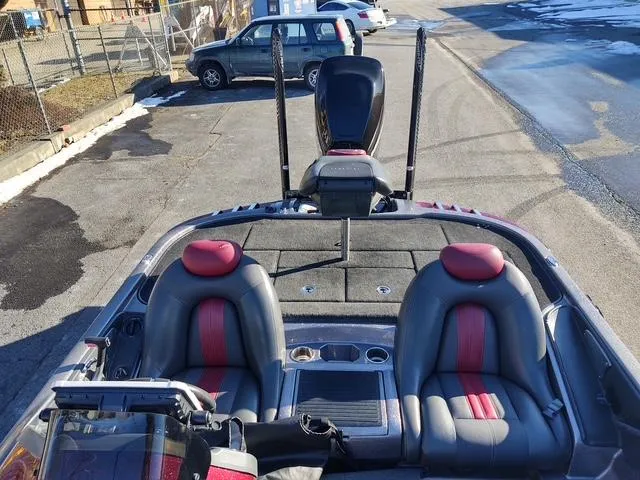 Slide: The Image of 2012 Ranger Z519 Comanche boat interior with dual seats and fishing equipment. - 1