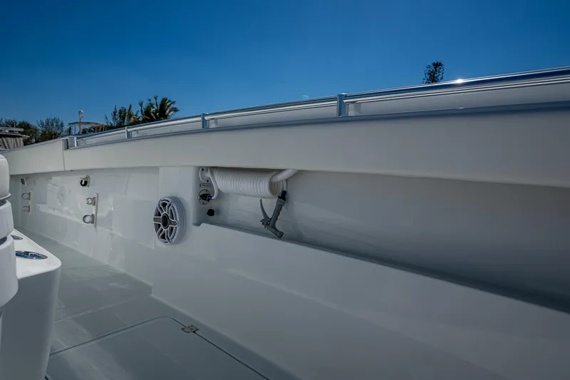 Slide: The Image of 2025 Invincible 33 Catamaran deck with sleek design and modern features. - 13