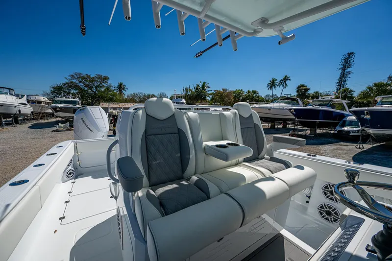 Slide: The Image of 2025 Invincible 33 Catamaran interior with luxurious seating and modern design. - 24