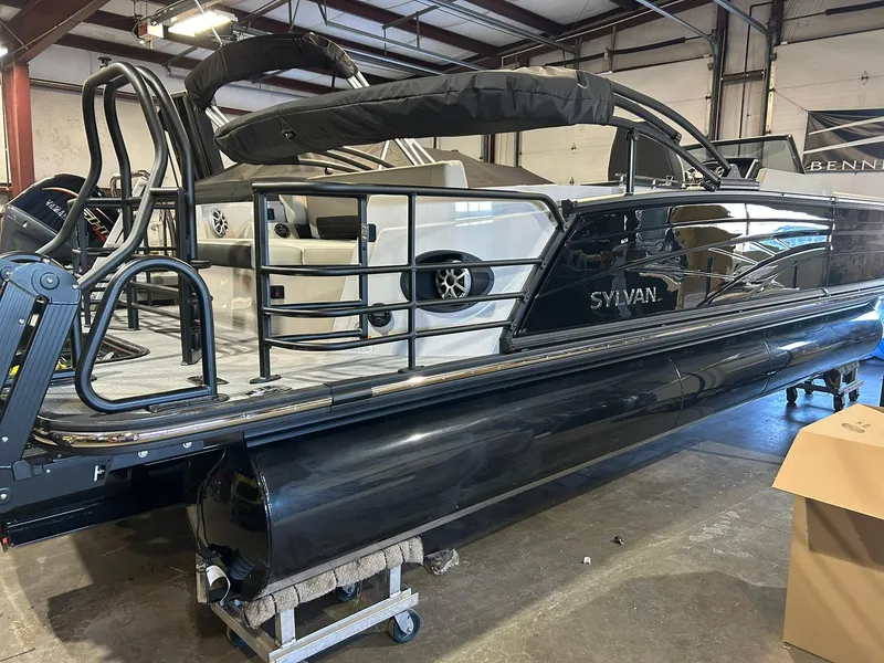 Slide: The Image of 2025 Sylvan G5 CLZ pontoon boat in a showroom, showcasing sleek design and modern features. - 17