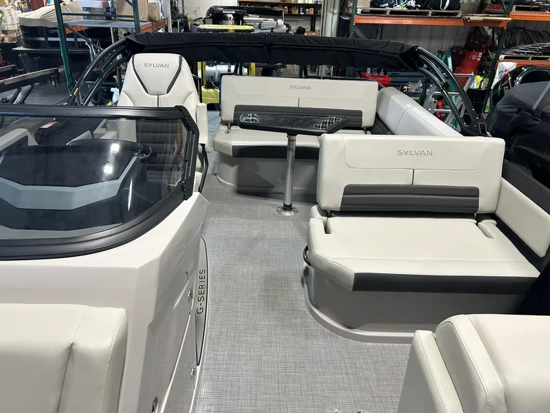 Slide: The Image of 2025 Sylvan G5 CLZ boat interior with spacious seating and modern design. - 7