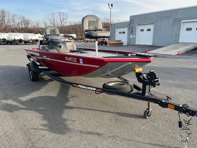 Slide: The Image of 2023 Tracker Pro 170 boat on trailer in parking lot. - 7