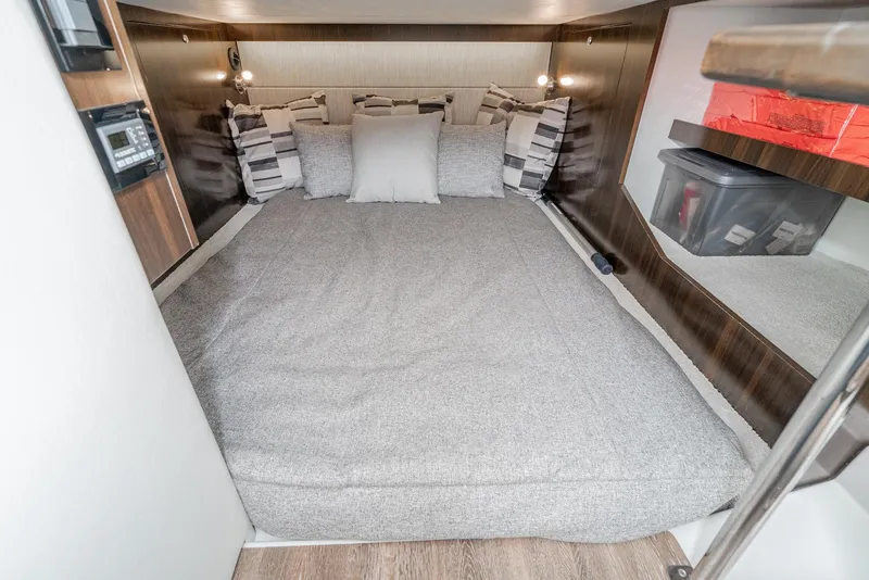 Slide: The Image of 2022 Cruisers Yachts 38 GLS cabin interior with cozy bed and modern design. - 30