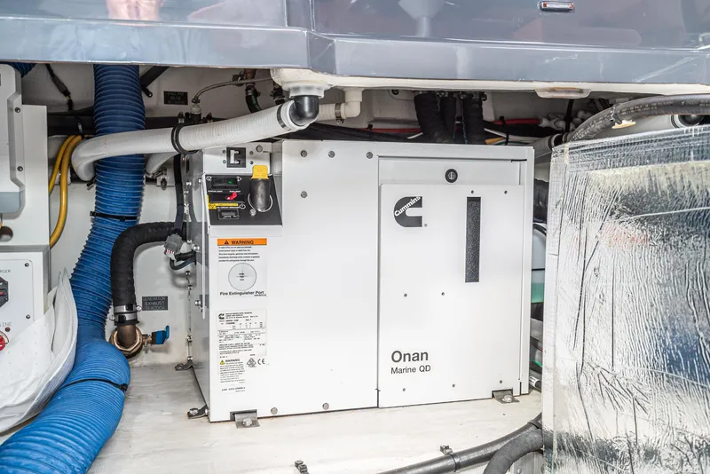 Slide: The Image of Engine room of 2022 Cruisers Yachts 38 GLS with Onan Marine QD generator. - 35