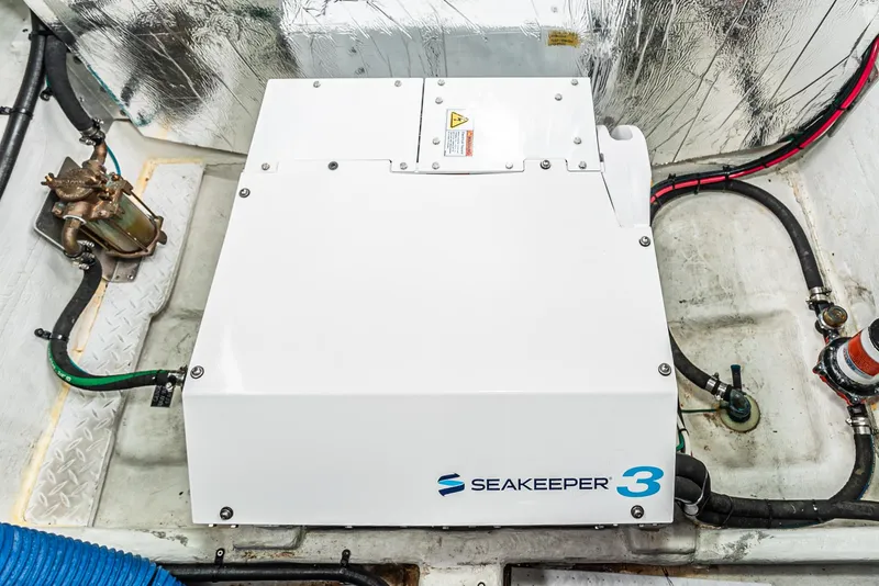Slide: The Image of Seakeeper 3 stabilizer in 2022 Cruisers Yachts 38 GLS engine room. - 36