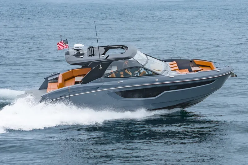 Slide: The Image of 2022 Cruisers Yachts 38 GLS speeding on water, featuring sleek design and modern amenities. - 37