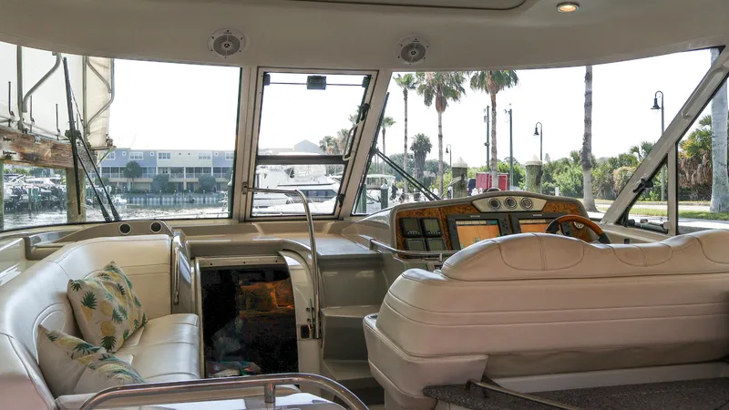 Slide: The Image of Interior view of 2007 Formula 45 Yacht with plush seating and modern dashboard. - 13