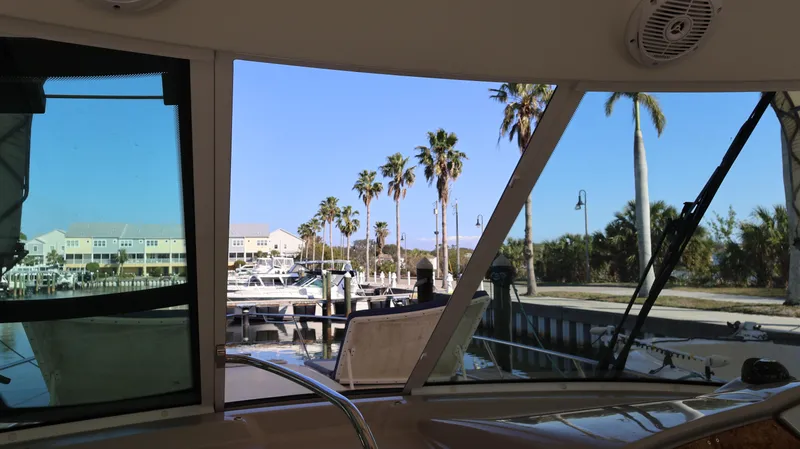 Slide: The Image of View from 2007 Formula 45 Yacht showing marina and palm trees. - 15