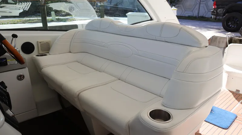Slide: The Image of Interior seating of 2007 Formula 45 Yacht with white leather upholstery and cup holders. - 17