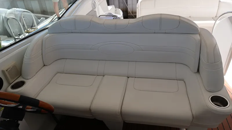 Slide: The Image of Luxurious seating on a 2007 Formula 45 Yacht, featuring elegant white upholstery. - 18