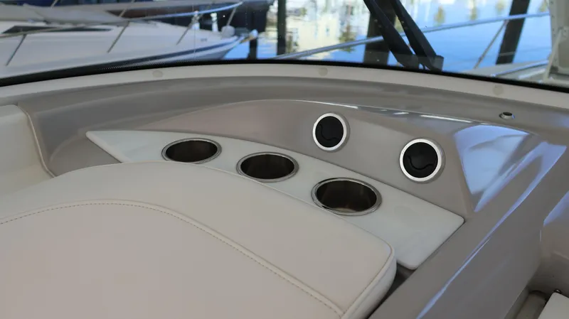 Slide: The Image of Interior view of 2007 Formula 45 Yacht with cup holders and sleek design. - 33
