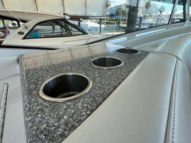 Slide: The Image of 2007 Formula 45 Yacht interior with granite countertop and built-in cup holders. - 34