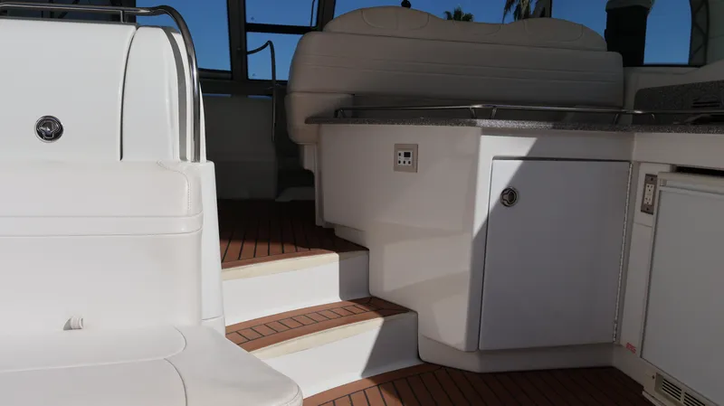 Slide: The Image of Interior view of 2007 Formula 45 Yacht with white seating and wooden flooring. - 35