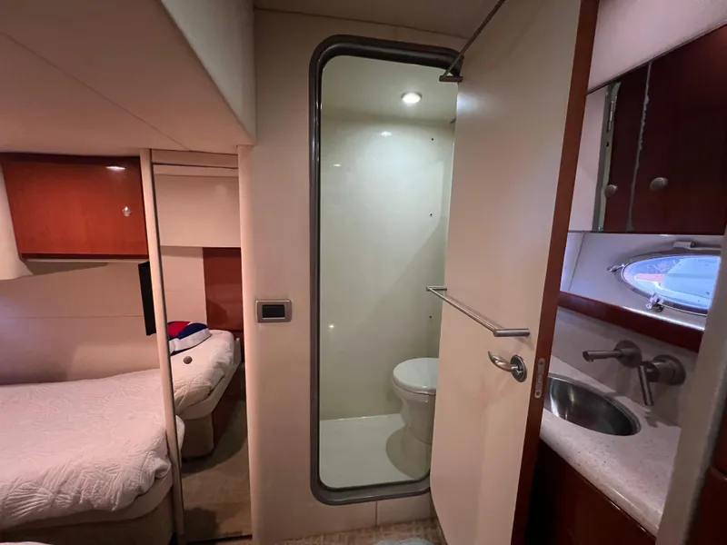 Slide: The Image of 2007 Formula 45 Yacht interior with bedroom and bathroom view. - 58