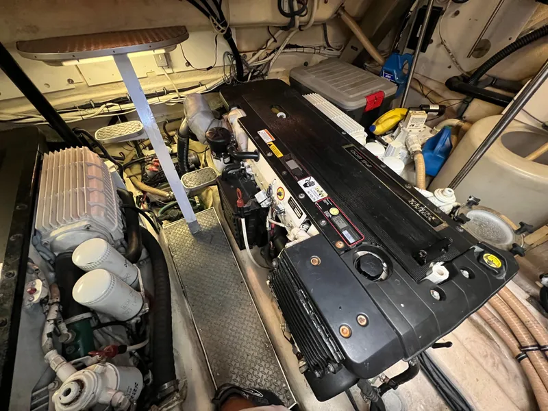 Slide: The Image of Engine room of a 2007 Formula 45 Yacht, showcasing detailed mechanical components. - 62