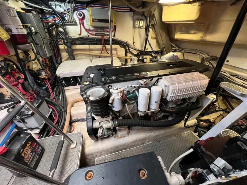 Slide: The Image of Engine room of a 2007 Formula 45 Yacht, showcasing detailed mechanical components. - 63