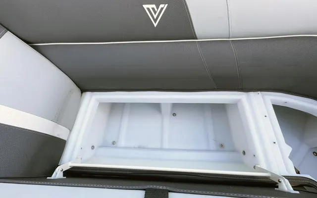 Slide: The Image of Viaggio Lago X22U 2025 boat seat storage compartment with sleek design and logo. - 15
