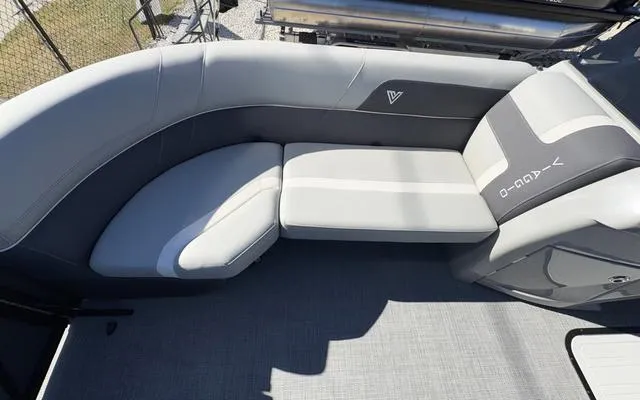 Slide: The Image of 2025 Viaggio Lago X22U boat interior with sleek gray seating. - 17