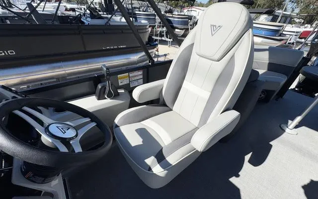 Slide: The Image of Captain's chair and steering wheel of 2025 Viaggio Lago X22U boat. - 21