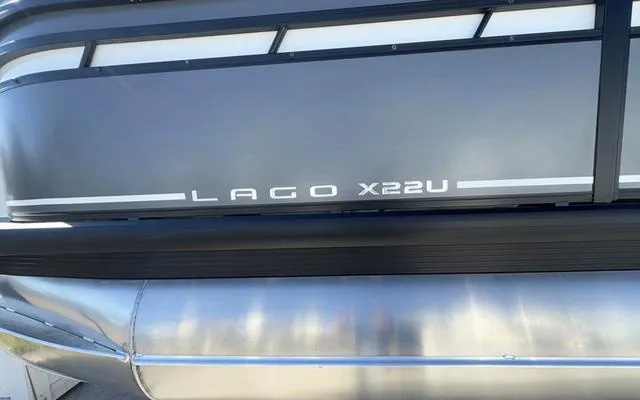 Slide: The Image of 2025 Viaggio Lago X22U pontoon boat, sleek design with metallic finish. - 3