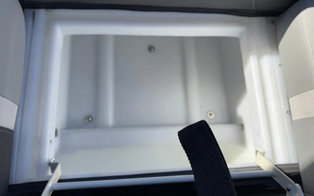 Slide: The Image of Storage compartment of 2025 Viaggio Lago X22U boat, open and empty. - 37