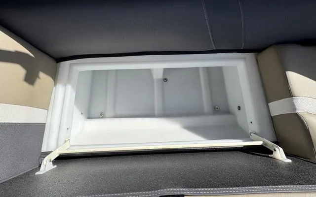 Slide: The Image of Viaggio Lago X 22 U 2025 boat storage compartment with open lid, showcasing interior space. - 17