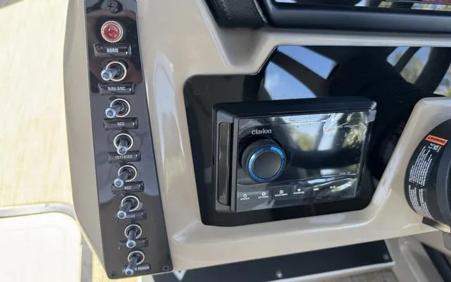 Slide: The Image of Control panel of 2025 Viaggio Lago X 22 U with Clarion audio system. - 21