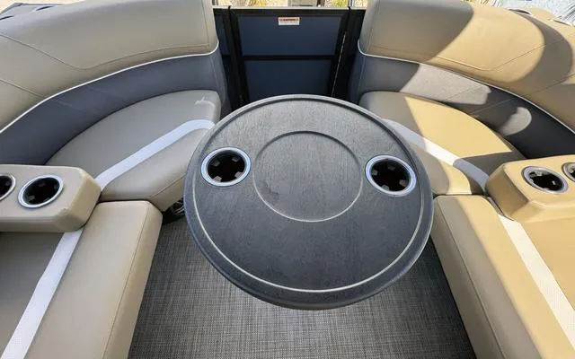 Slide: The Image of Interior of 2025 Viaggio Lago X 22 U pontoon boat with seating and table. - 28