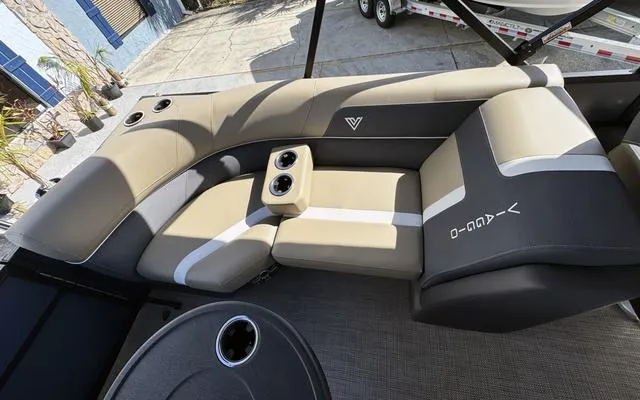 Slide: The Image of Luxurious seating on 2025 Viaggio Lago X 22 U pontoon boat with cup holders. - 29