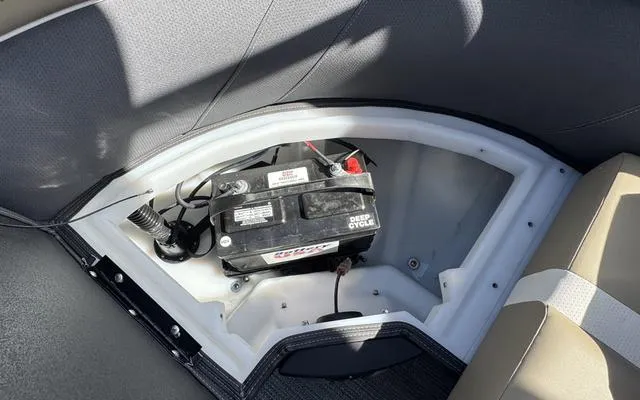 Slide: The Image of Battery compartment of 2025 Viaggio Lago X 22 U boat, featuring a deep cycle battery. - 30